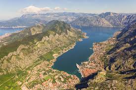 <!-- wp:paragraph --> <p>📸 <em>Image Suggestion:</em> Bay of Kotor aerial view.<br><strong>Alt Text:</strong> Aerial view of Kotor Bay, Montenegro.