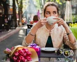 Solo traveler at a café in an offbeat European city