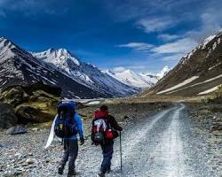 Solo traveler hiking in Himachal Pradesh, India.